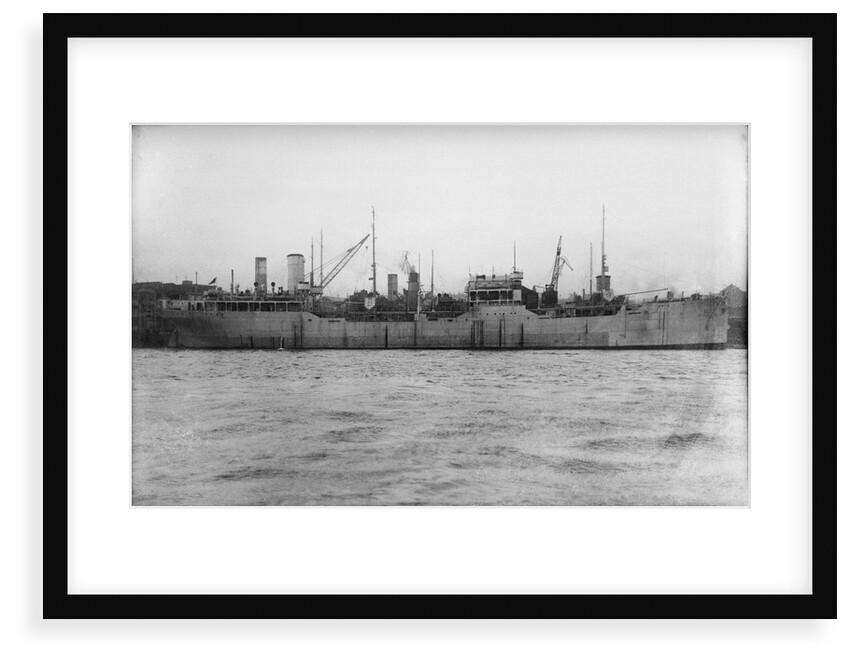 A starboard broadside view of the tanker 'British Prestige' (1931) lying in port, alongside other vessels by unknown