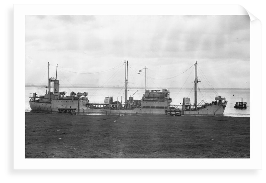A starboard broadside view of 'Empire Crest' (1944) lying at dolphins by unknown