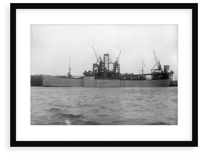 'Essex Lance' (Br, 1918) at quayside, under a coal hoist. by unknown