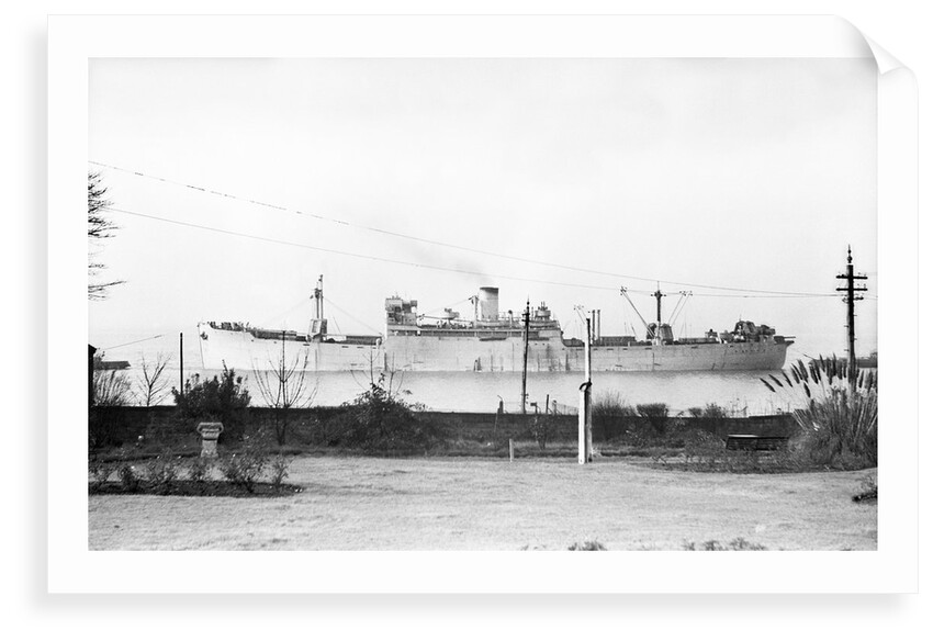 Cargo liner 'Manchester Port' (1935) under tow with topmasts struck by unknown