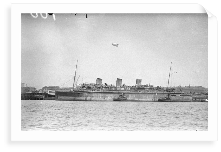 'Monarch of Bermuda' (1931) alongside in the River Mersey in 1942-1943, probably refitting as a mercantile LSI(L) by unknown