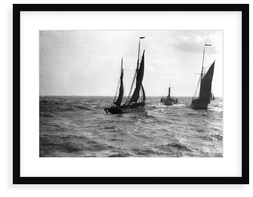 The dandy-rigged trawler 'Speranza' (1891) [LT431] under sail, with an unidentified trawler being towed by the paddle tug 'Imperial' (1879) at Lowestoft, Suffolk by Smiths Suitall Ltd.