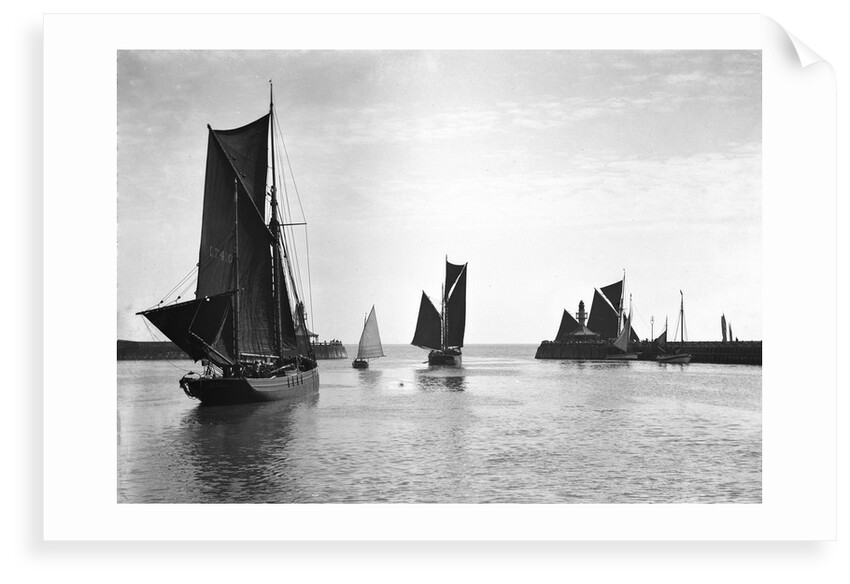 The trawler 'Roma' (1906) [LT410] with an unidentified trawler sailing out of the outer harbour at Lowestoft, Suffolk by Smiths Suitall Ltd.