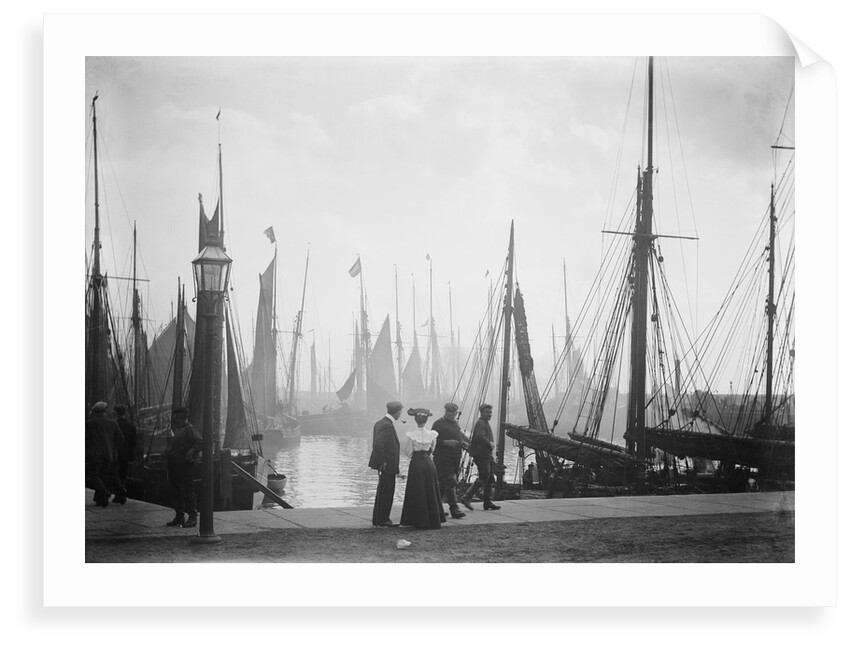 Trawlers berthed in the outer harbour with the morning mist rising at Lowestoft, Suffolk by Smiths Suitall Ltd.
