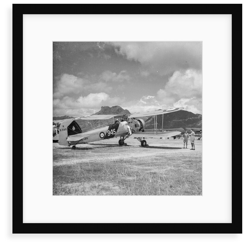 Fairey Swordfish I torpedo bomber reconnaissance biplane aircraft K8386, code 945, of 824 Squadron Fleet Air Arm, on Kai Tak airfield, Hong Kong by David Watkin Waters