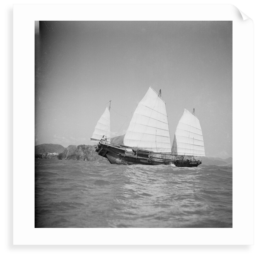 A starboard side view of a Hong Kong fisher d.w. type junk under sail at Hong Kong by David Watkin Waters