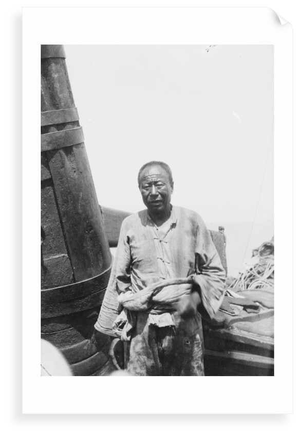 An elderly man on board an Antung trader type junk anchored at Weihaiwei by David Watkin Waters