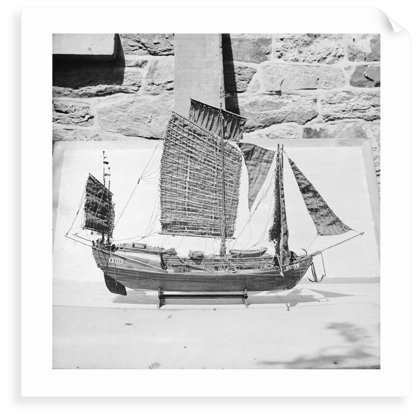 A starboard broadside view of as model of the Antung trader type junk 1938 on a display stand at Liu Kung Tao near Weihaiwei by David Watkin Waters