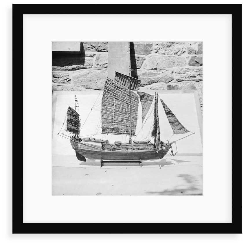 A starboard broadside view of as model of the Antung trader type junk 1938 on a display stand at Liu Kung Tao near Weihaiwei by David Watkin Waters