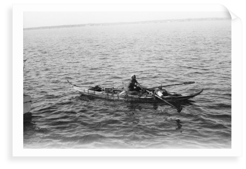 Man on a small boat by unknown