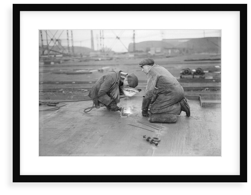 Robert the Bruce. Two welders at work aboard the vessel. by unknown