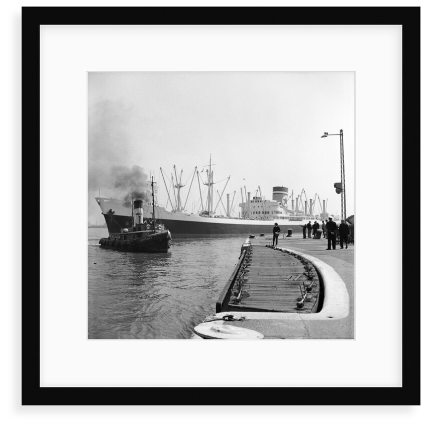The Blue Star Line's 'Auckland Star'entering the King George V Dock in April 1964, assisted by the tug 'Atlantic Cock'. The 'Auckland Star' remained in service until 1978. by Grierson Collection