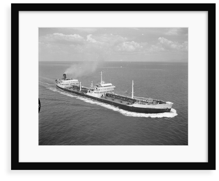 A starboard bow view of 'Amastra' (1958); Under way in the Strait of Malacca. by Unknown