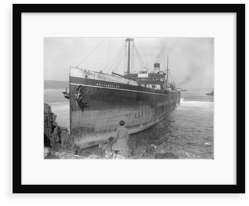 The cargo ship Archangelos (1918) with tugs in the background by Gibson & Sons of Scilly
