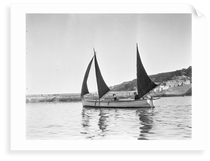 Mounts Bay pilot gig, under sail in Newlyn harbour, setting fore staysail and standing lugs with booms on fore and mizzen masts by unknown