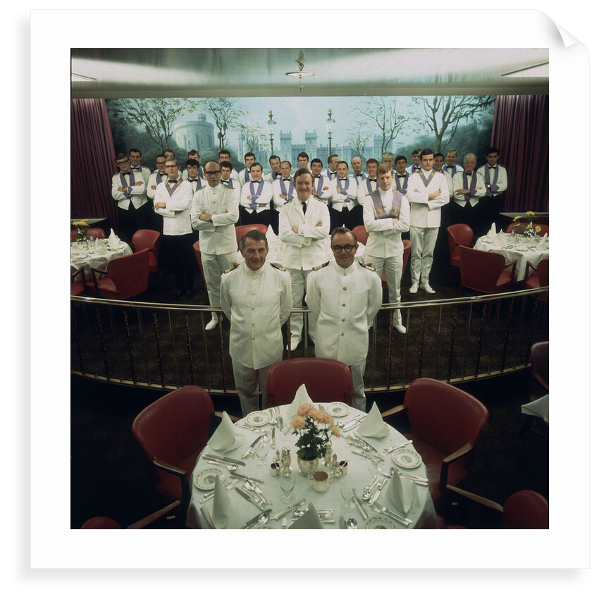 The restaurant staff on the Union-Castle cruise ship 'Windsor Castle' gather for a group photograph by Marine Photo Service