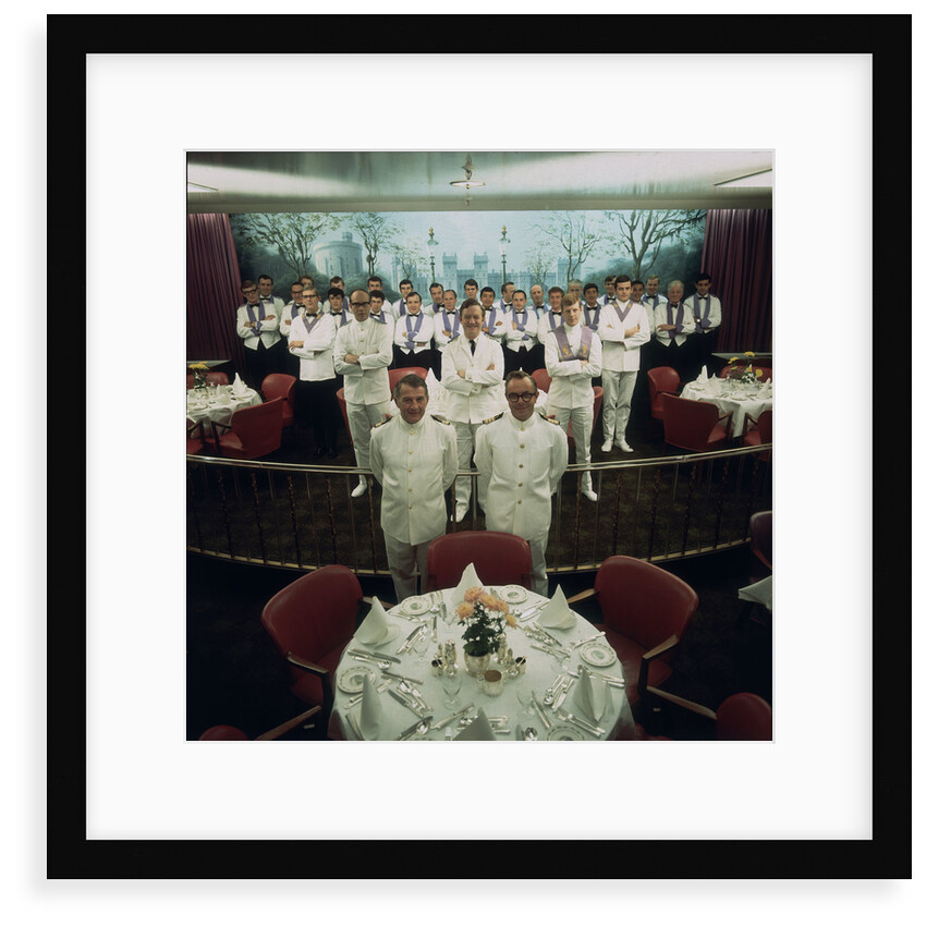 The restaurant staff on the Union-Castle cruise ship 'Windsor Castle' gather for a group photograph by Marine Photo Service