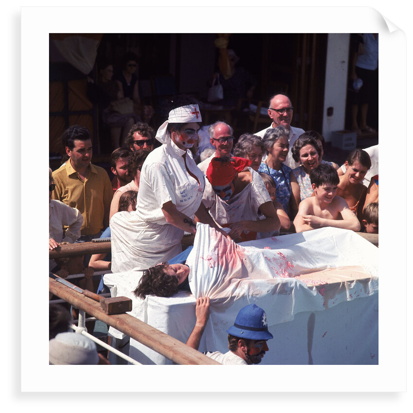 Macabre comic entertainment aboard an unspecified cruise ship - perhaps a variant of the Crossing the Line (the Equator) ceremony? by Marine Photo Service