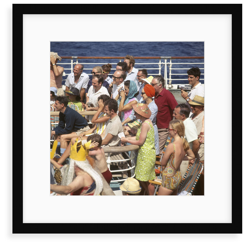 Interested passengers, young and old, enjoy on-deck entertainment aboard an unspecified cruise liner by Marine Photo Service