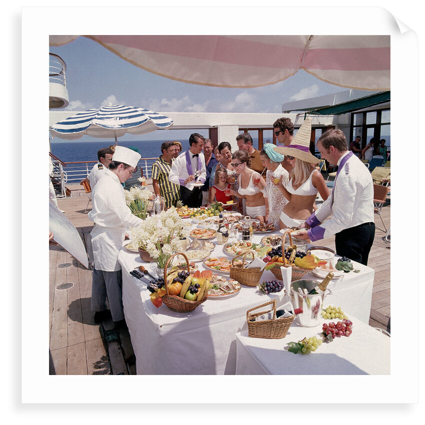 Fine weather allows passengers to enjoy a casual buffet on deck - no need to dress for dinner on this occasion! by Union Castle Line Collection