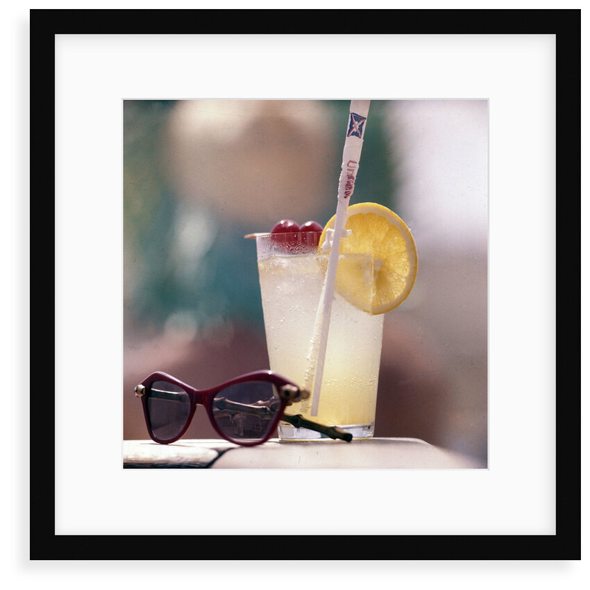 Cocktail and sunglasses aboard a Union-Castle cruise liner by Marine Photo Service