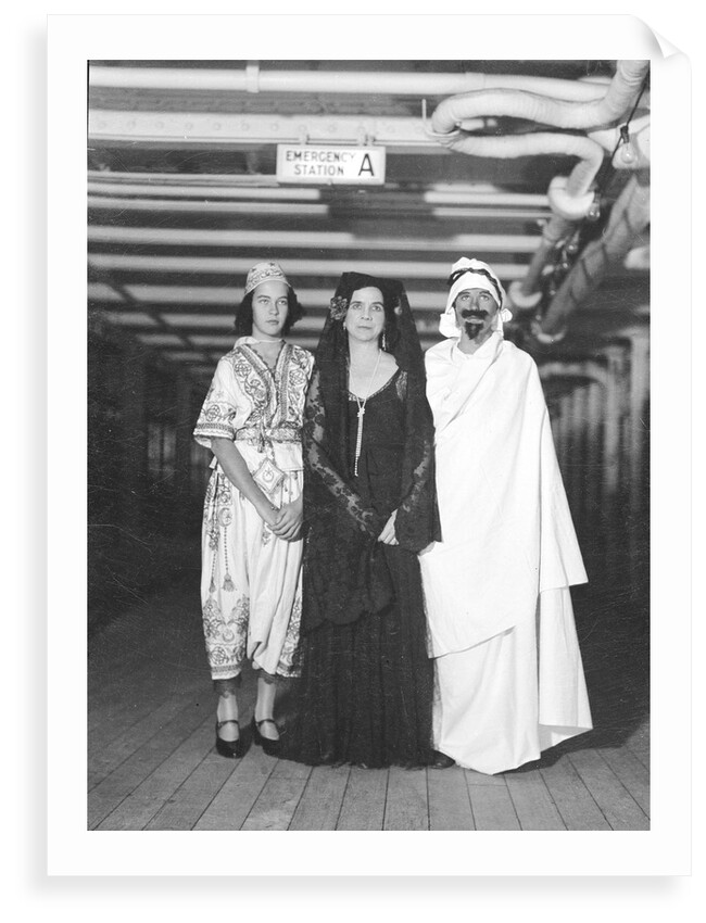 Passengers dress up in Middle Eastern costume for an obscure tableau aboard an unspecified cruise ship by Marine Photo Service