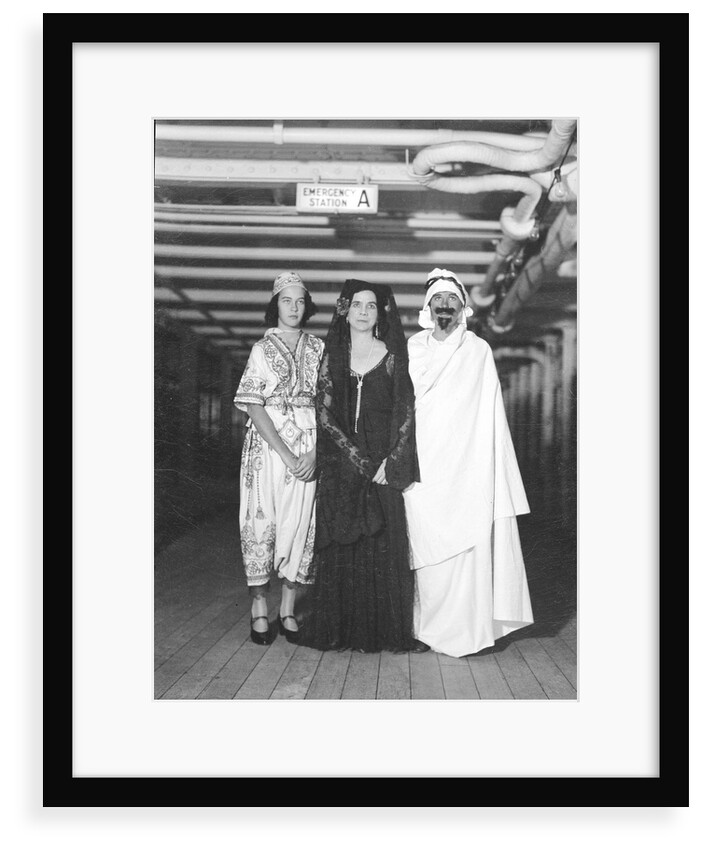 Passengers dress up in Middle Eastern costume for an obscure tableau aboard an unspecified cruise ship by Marine Photo Service