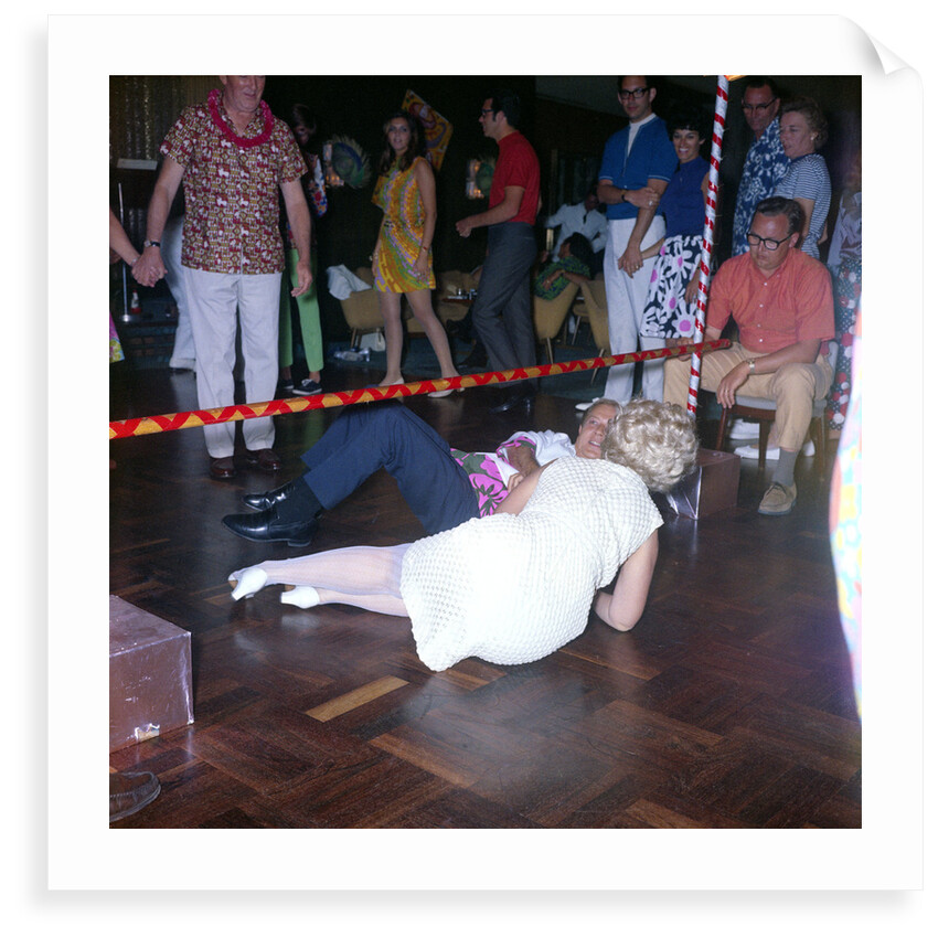Passengers go under the limbo stick aboard the liner 'Gripsholm' by Marine Photo Service