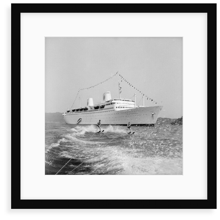 Waterskiers pass the 'Kungsholm' at Acapulco by Marine Photo Service