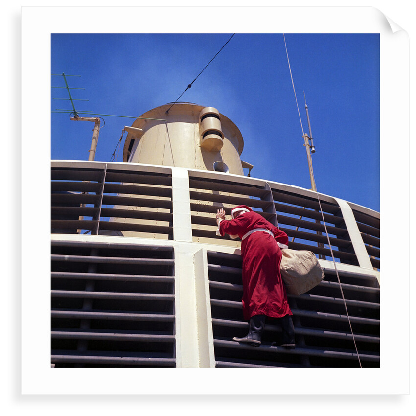 Father Christmas, or Santa Claus, climbing the grill in front of the forward funnel above the bridge on 'Oriana' (1960) by Marine Photo Service