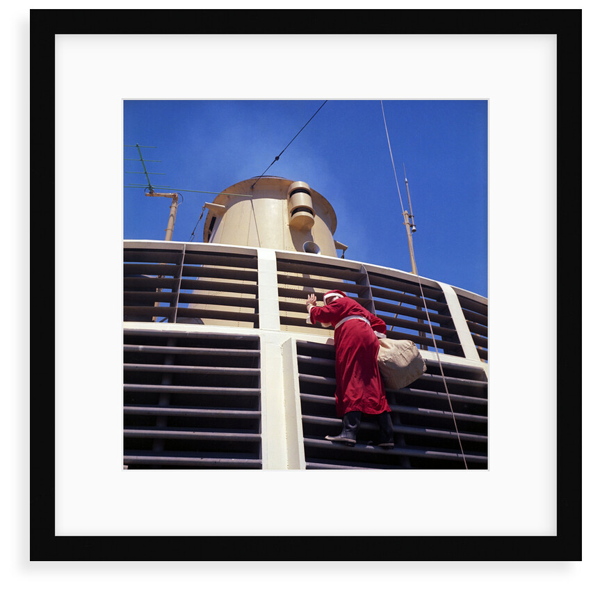 Father Christmas, or Santa Claus, climbing the grill in front of the forward funnel above the bridge on 'Oriana' (1960) by Marine Photo Service