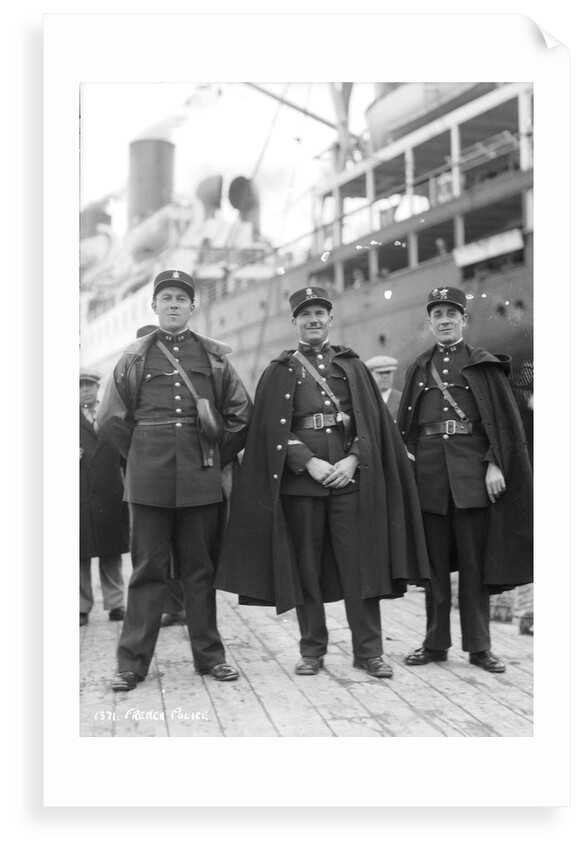 Gendarmes holding back the throng of Muslim men at quayside, Algiers, Algeria, 1925 by Marine Photo Service