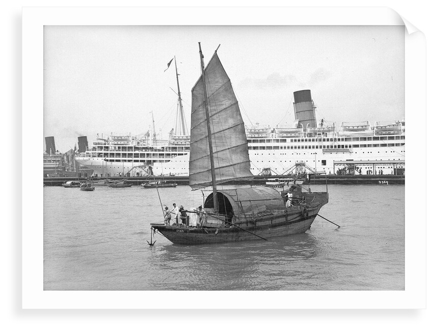 A junk in Hong Kong harbour, 1933 by Marine Photo Service