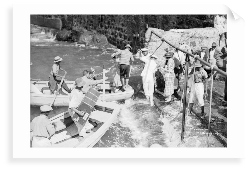 Passengers embarking into local boats from the landing stage, St Helena by Marine Photo Service