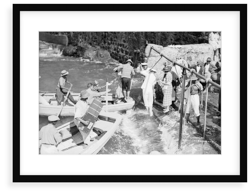 Passengers embarking into local boats from the landing stage, St Helena by Marine Photo Service