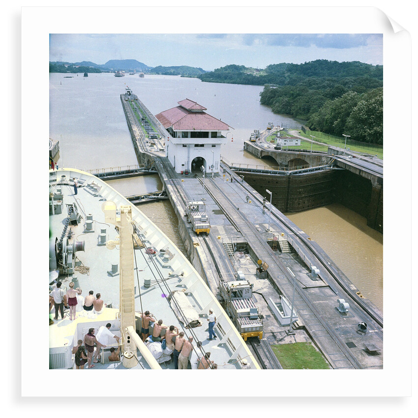 A view from the bridge of 'Gripsholm' (1957) or 'Kungsholm' (1966) of the Pedro Miguel Lock, Panama Canal, with the Miraflores Lock in the background. by Marine Photo Service