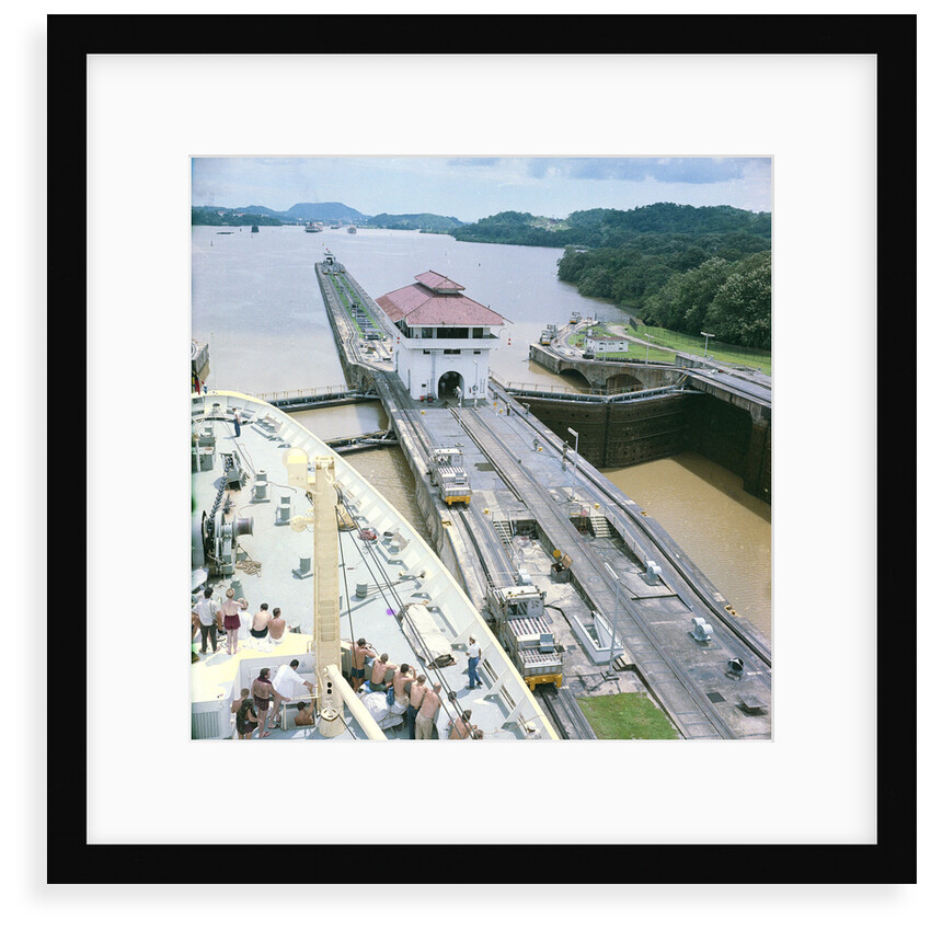 A view from the bridge of 'Gripsholm' (1957) or 'Kungsholm' (1966) of the Pedro Miguel Lock, Panama Canal, with the Miraflores Lock in the background. by Marine Photo Service
