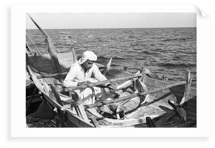 Carpenter building a small jalboot by Alan Villiers