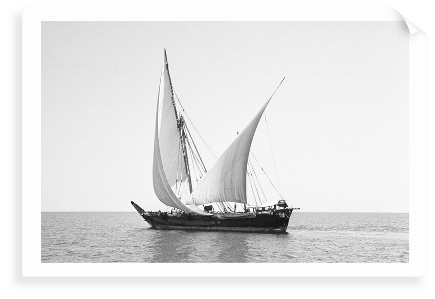 A boom in calm waters off the South Arabian or Omani coast by Alan Villiers