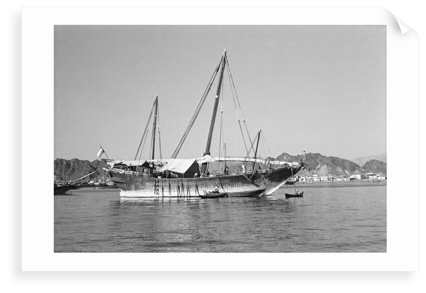 A large baggala in Mutrah harbour by Alan Villiers