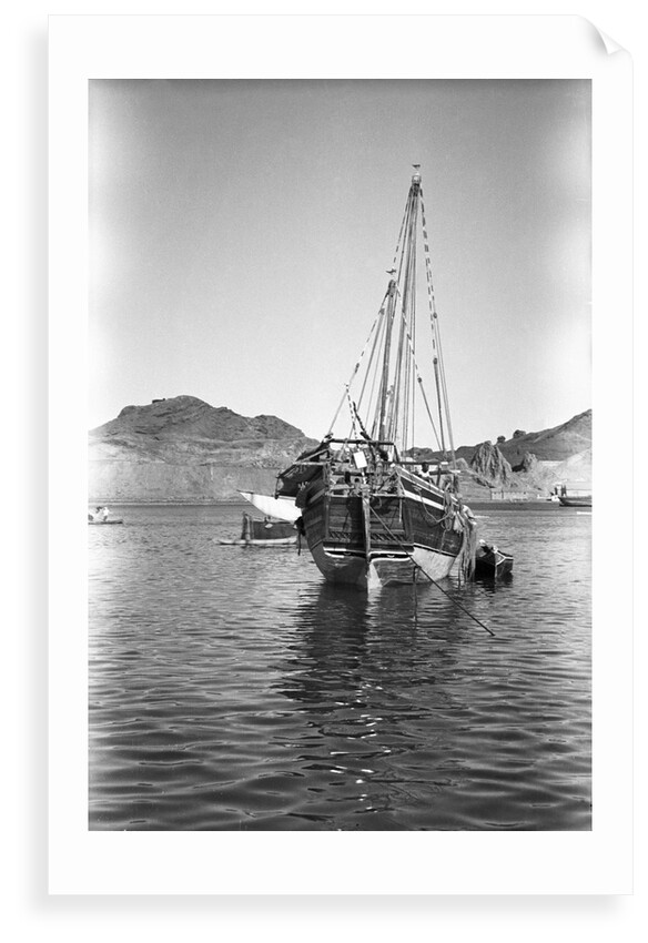 A small Yemeni sambuk lies at anchor, Ma'alla by Alan Villiers