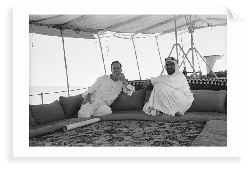 Sheikh Ahmad bin Jabir al-Sabah, Ruler of Kuwait, seated with the British Political Agent, Major A. C. Galloway by Alan Villiers