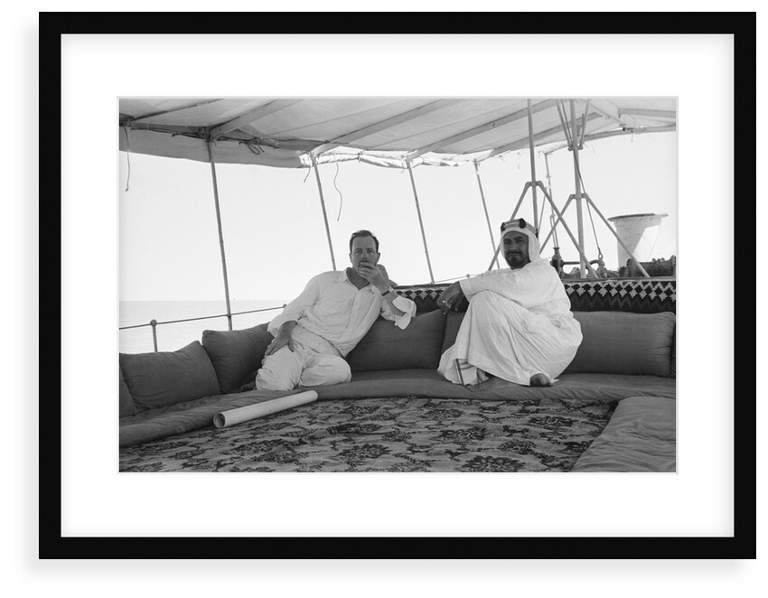 Sheikh Ahmad bin Jabir al-Sabah, Ruler of Kuwait, seated with the British Political Agent, Major A. C. Galloway by Alan Villiers