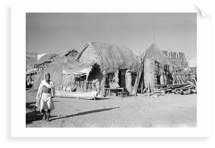 Jizan market with 'ushshah' houses by Alan Villiers