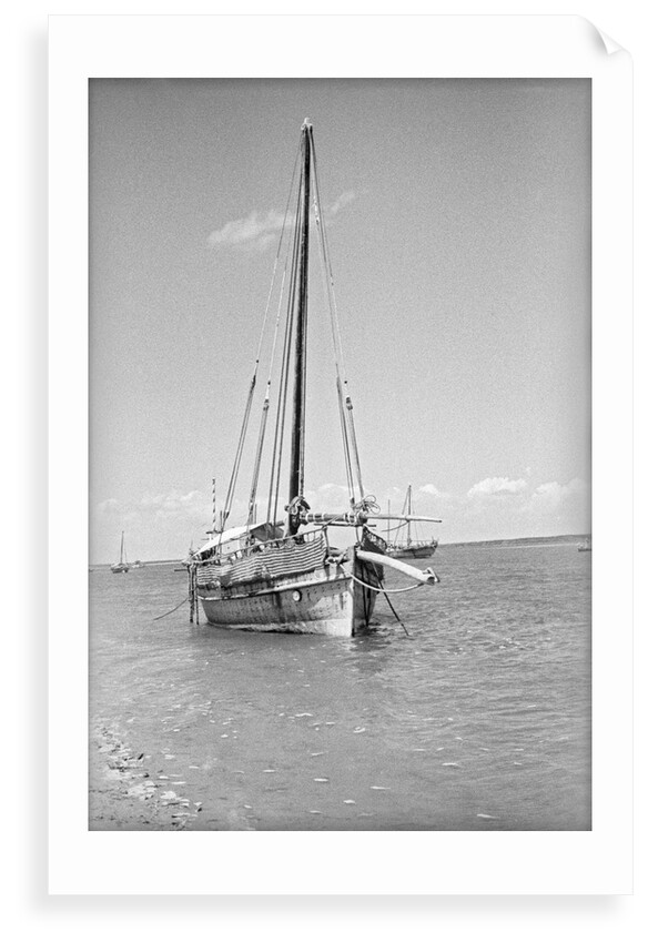 Typical Lamu dhow at anchor by Alan Villiers