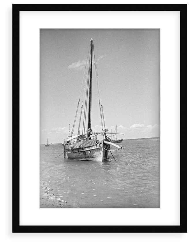 Typical Lamu dhow at anchor by Alan Villiers