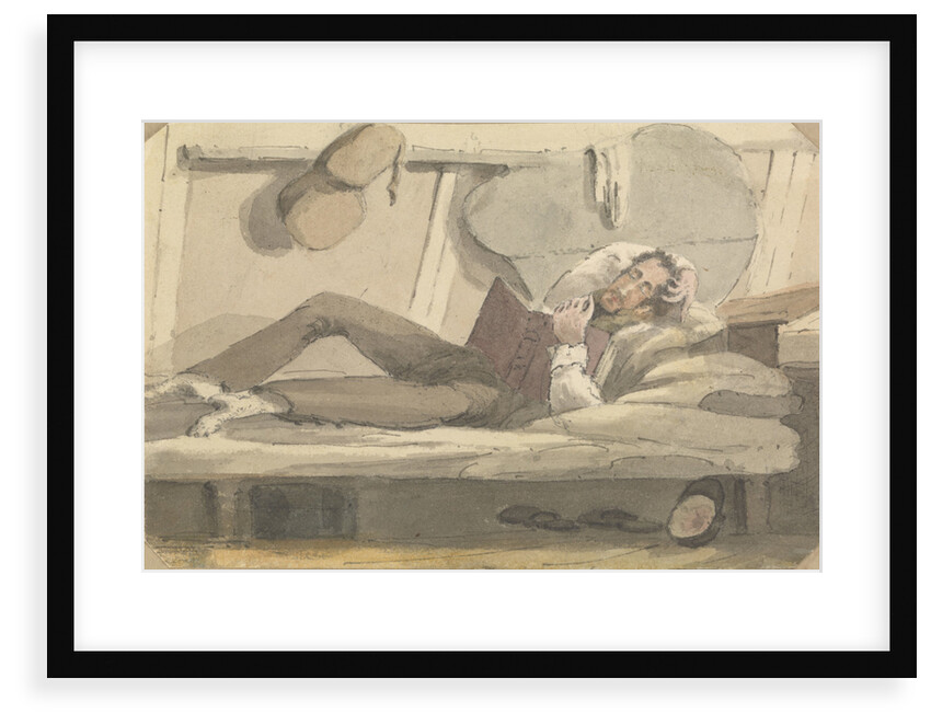 Full length view of man relaxing on a bunk reading a book by Robert Streatfeild