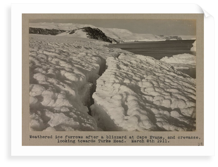 Weathered ice after blizzard at Cape Evans, and crevasse, looking towards Turks Head. by Herbert George Ponting