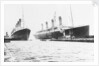 Passenger liner 'Titanic' (Br, 1912) Oceanic Steam Nav Co Ltd, (Ismay Imrie & Co Ltd, managers) (White Star Line): at Belfast with 'Olympic', tip of foremast out of picture by unknown