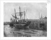 Stern quater view of copper ship and others aground at low tide by unknown